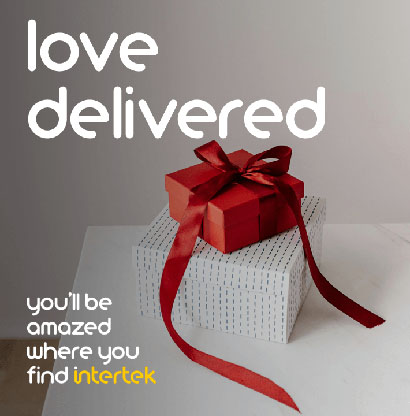 A red giftbox wrapped with a red bow